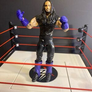 THE UNDERTAKER Mattel 2011 WWE Wrestling Figure Flashback Legends Purple Black